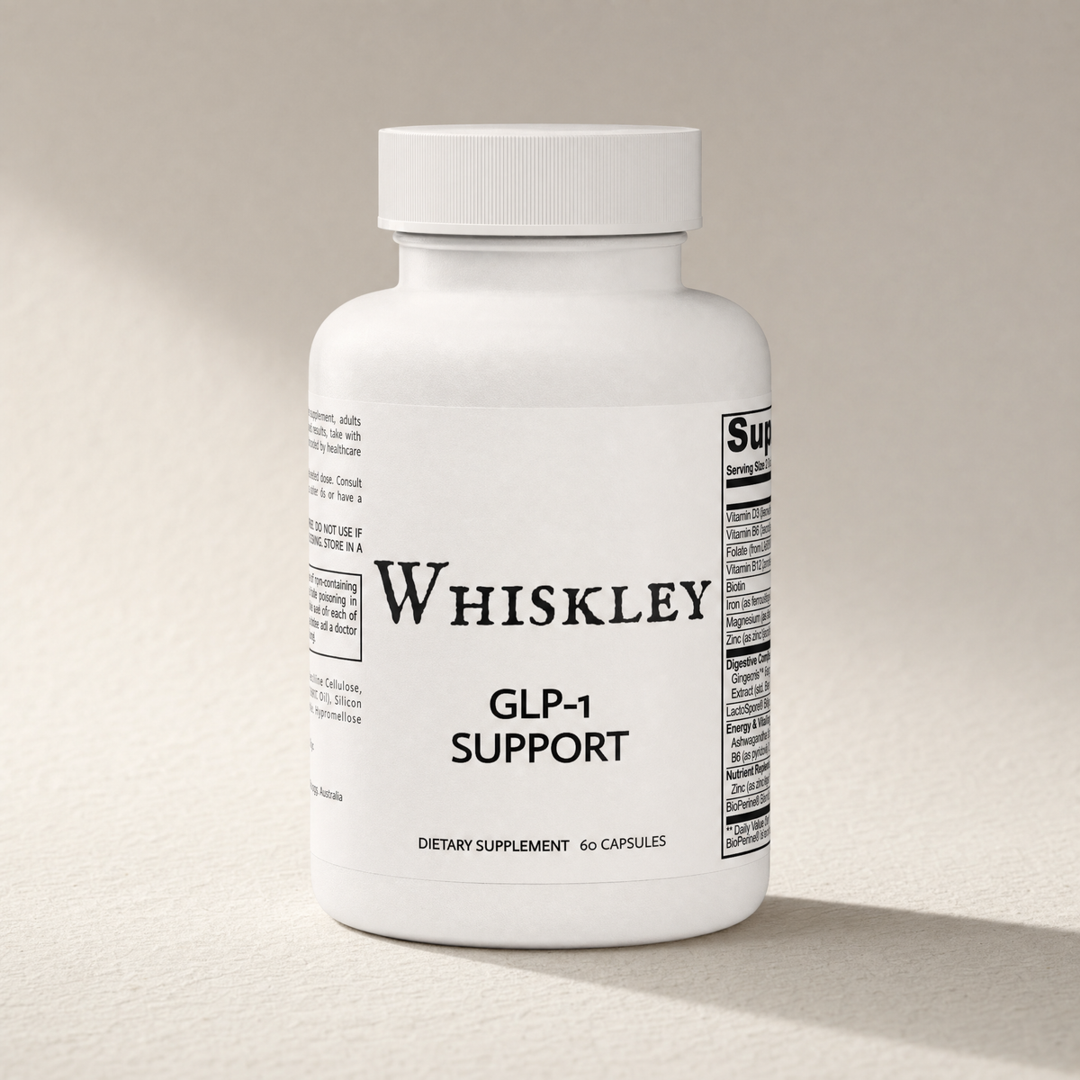 Whiskley GLP-1 Support sealed white supplement bottle with ribbed cap standing on textured washi paper, warm side light and soft shadow